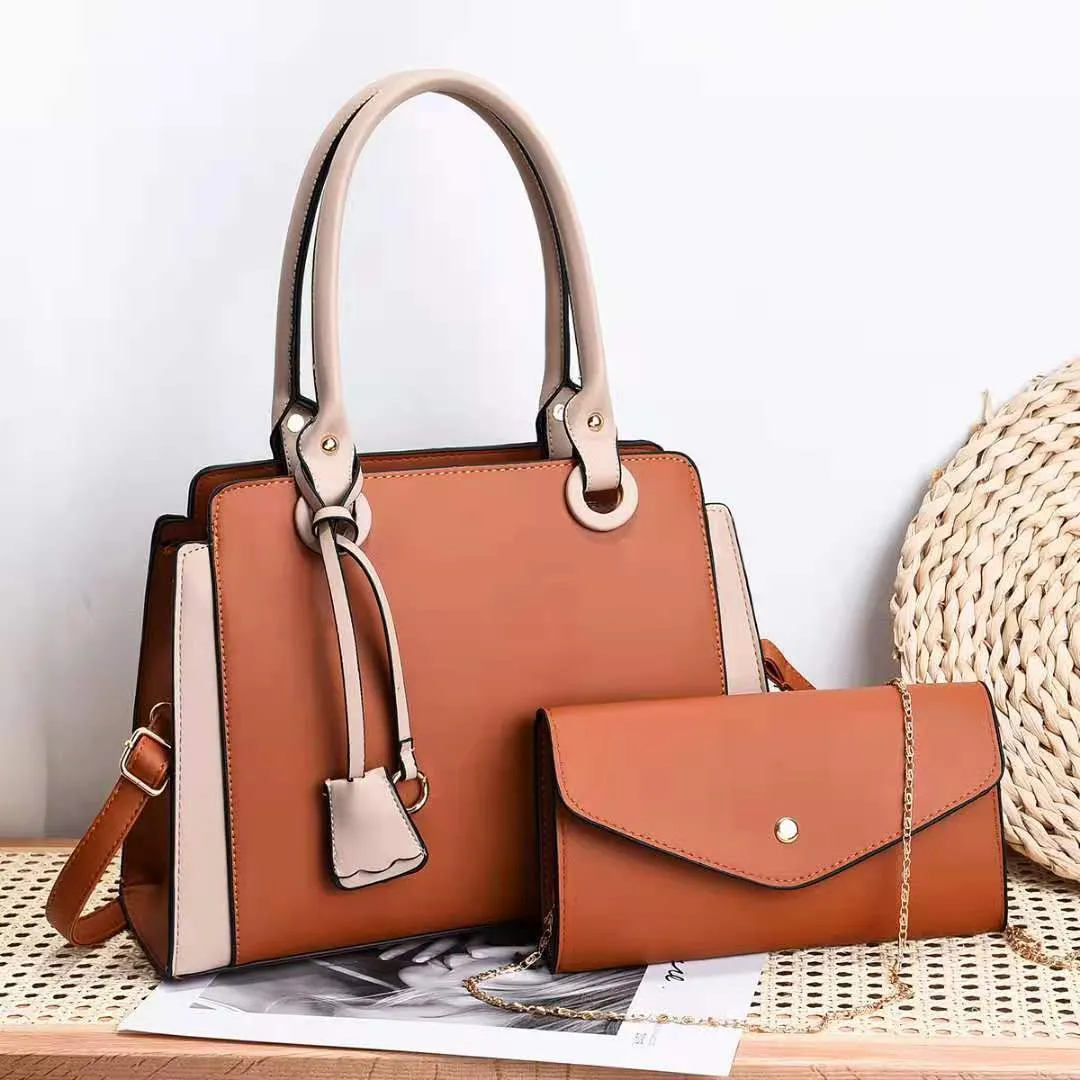 Joanne – Blue Structured Handbag with Matching Clutch and Black Handles