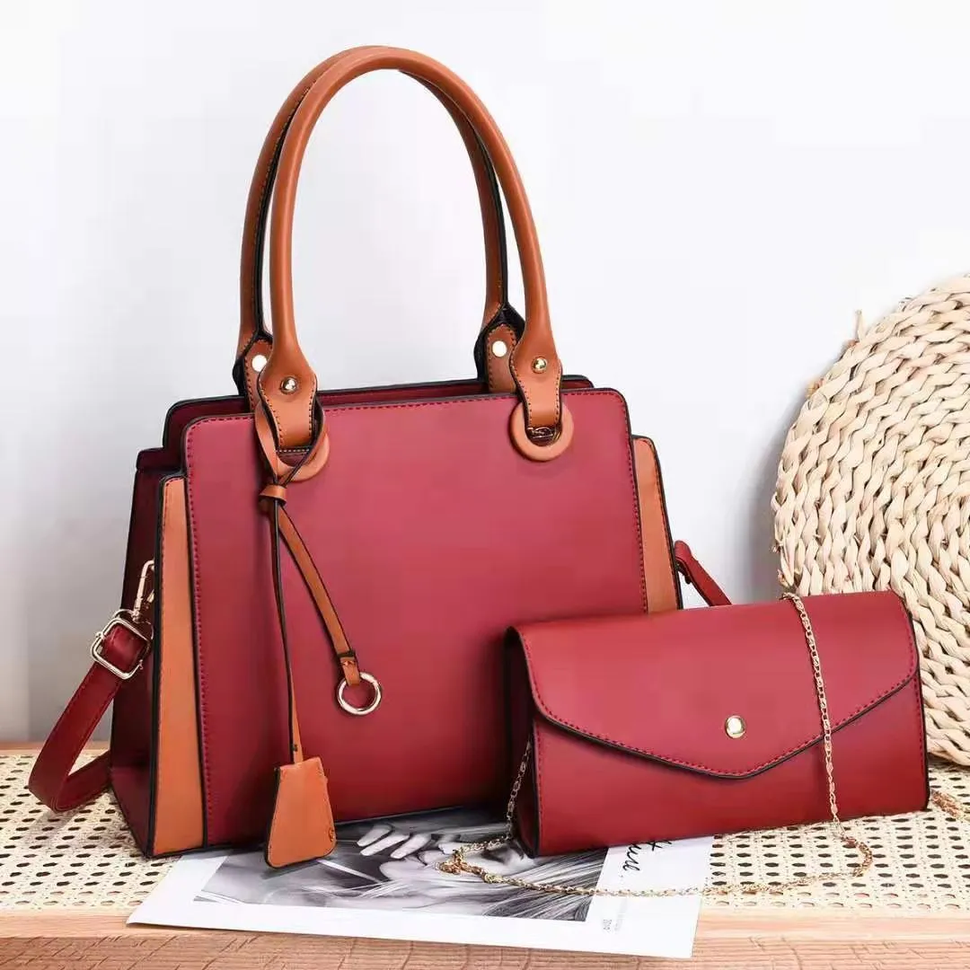 Joanne – Blue Structured Handbag with Matching Clutch and Black Handles