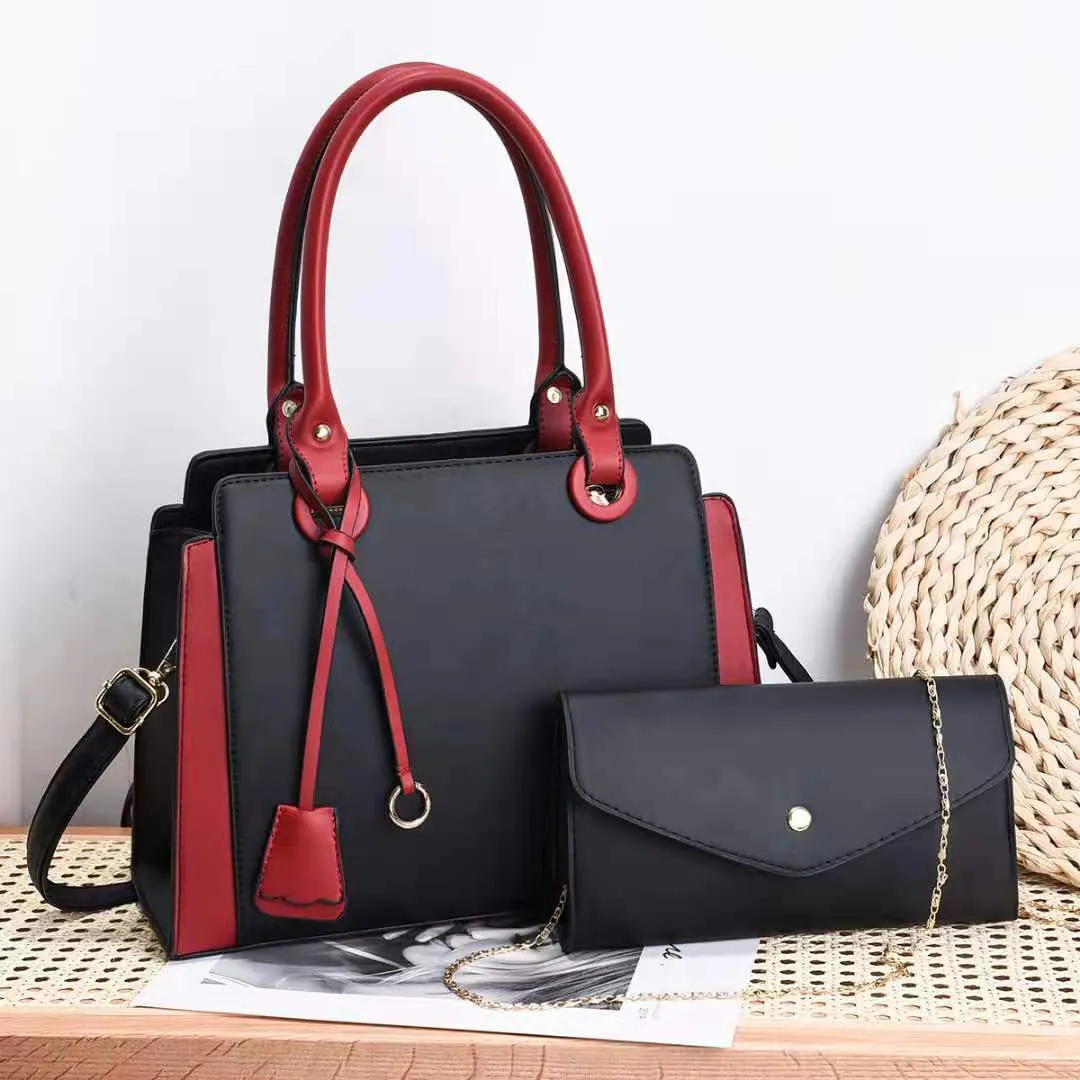 Joanne – Blue Structured Handbag with Matching Clutch and Black Handles