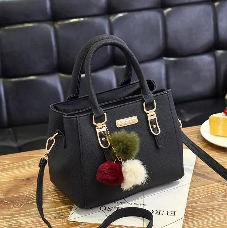 Wendy – Compact Structured Handbag with Fur Pom-Pom Charm